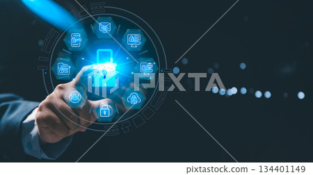 Business professional touching glowing holographic lock surrounded by security icons, cybersecurity, data protection, secure systems, digital privacy, advanced information security technology Business professional touching glowing holographic lock surrounded by security icons, cybersecurity, data protection, secure systems, digital privacy, advanced information security technology 134401149