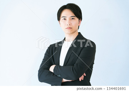 Businessman with arms folded 134401691