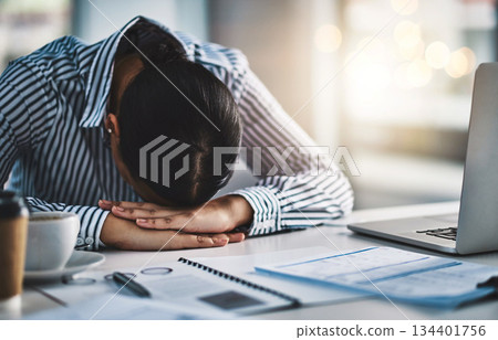 Sleeping, stress and business woman in office for headache, overworked and tired. Exhausted, burnout and mental health with female employee resting at desk for fatigue, dreaming and frustrated Sleeping, stress and business woman in office for headache, overworked and tired. Exhausted, burnout and mental health with female employee resting at desk for fatigue, dreaming and frustrated 134401756