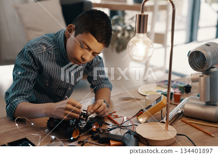 Education, car robot and child in home with homework, homeschool and science, learning and tech project. Robotics, building and boy kid with electrical knowledge, engineering and studying in house. Education, car robot and child in home with homework, homeschool and science, learning and tech project. Robotics, building and boy kid with electrical knowledge, engineering and studying in house. 134401897