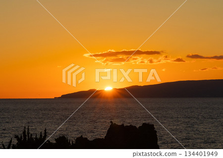Sunset over the sea 134401949
