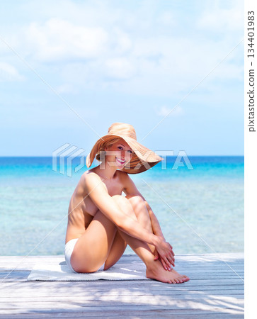 Travel, topless and portrait of woman at beach for sunbathing, summer break and freedom in Bali. Sexy, blue sky and tropical with girl in bikini on vacation for mockup, peace and happy on trip Travel, topless and portrait of woman at beach for sunbathing, summer break and freedom in Bali. Sexy, blue sky and tropical with girl in bikini on vacation for mockup, peace and happy on trip 134401983