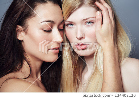 Beauty, face and portrait of women couple in studio for natural skin care, cosmetics and makeup. Lgbtq, gay or lesbian people together on a grey background for self love, dermatology and glow Beauty, face and portrait of women couple in studio for natural skin care, cosmetics and makeup. Lgbtq, gay or lesbian people together on a grey background for self love, dermatology and glow 134402126