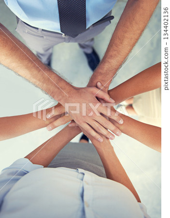 Top view, hands and team of business people with motivation, support and winning in success, target and trust. Hand huddle, stack and group cooperation for mission, partnership goals and faq about us 134402136