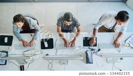 Call center, computer and top view with business people in office for communication, customer service and contact us. Help desk, online and team of employee in agency for consulting and advisory Call center, computer and top view with business people in office for communication, customer service and contact us. Help desk, online and team of employee in agency for consulting and advisory 134402155