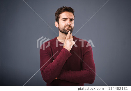 Doubt, thinking and portrait of man in studio with unsure, uncertain and thoughtful on gray background. Confused, mockup space and face of male person skeptical for decision, choice and question 134402181