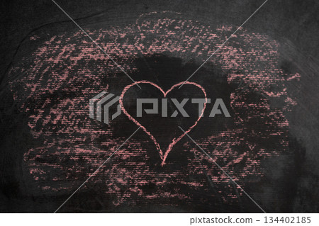 Pink Heart Drawn on Chalkboard for Valentine's Day Celebration 134402185