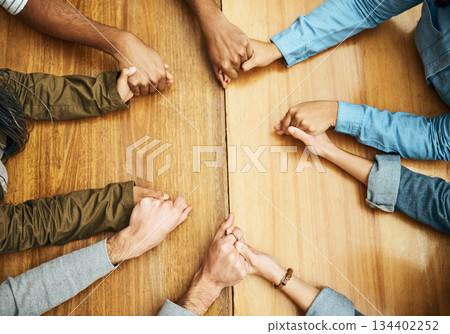 Hands, support and praying people with trust, love and care for religion or spiritual connection as a group or team. Above, community and christian family doing worship prayer for gratitude 134402252
