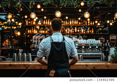 Cozy Bar Scene with Bartender Preparing Drinks in a Stylish Ambiance at Night 134402399