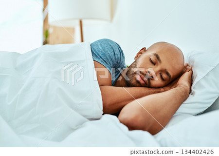 Relax, sleeping and man in bed, home and wellness with peace, comfortable or happiness. Male person, African or guy in a bedroom, healthy rest or dreaming with comfort, sleepy or tired with a blanket 134402426