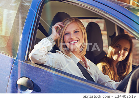 Car, travel and friends smile, happy and on urban city journey, transport or street road trip in motor vehicle. Automobile transportation, driver happiness and driving woman looking at window view Car, travel and friends smile, happy and on urban city journey, transport or street road trip in motor vehicle. Automobile transportation, driver happiness and driving woman looking at window view 134402519
