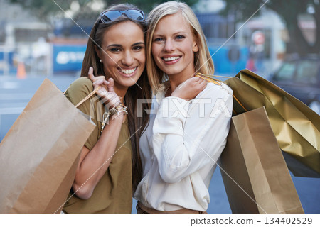 Shopping bag, urban portrait and happy people, friends or customer on retail spree for boutique sales, fashion or clothes. Discount promotion deal, store present gift and city women with mall product Shopping bag, urban portrait and happy people, friends or customer on retail spree for boutique sales, fashion or clothes. Discount promotion deal, store present gift and city women with mall product 134402529