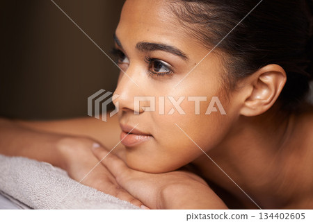 Girl thinking, face or massage to relax for zen resting or wellness physical therapy in spa hotel resort. Face or thoughtful woman dreaming of salon ideas for body healing treatment or holistic detox 134402605