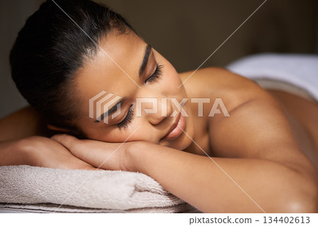 Girl client, sleeping or massage to relax for zen resting or wellness physical therapy in luxury skincare resort. Calm woman in salon to exfoliate for body healing treatment or natural holistic detox 134402613