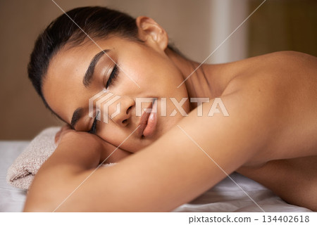 Woman, sleeping or massage in spa to relax for zen resting or wellness physical therapy in luxury hotel resort. Calm girl in salon to exfoliate for body healing treatment or holistic detox therapy 134402618