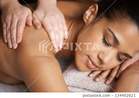 Woman, sleeping or hands for back massage in spa to relax for zen resting or wellness physical therapy. Face of girl in hotel salon for body healing treatment or natural holistic detox by masseuse Woman, sleeping or hands for back massage in spa to relax for zen resting or wellness physical therapy. Face of girl in hotel salon for body healing treatment or natural holistic detox by masseuse 134402621