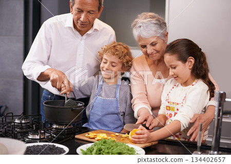 Help, happy children or grandparents teaching cooking skills for a healthy dinner with vegetables diet at home. Learning, kids siblings helping or grandmother with old man or food meal in kitchen Help, happy children or grandparents teaching cooking skills for a healthy dinner with vegetables diet at home. Learning, kids siblings helping or grandmother with old man or food meal in kitchen 134402657
