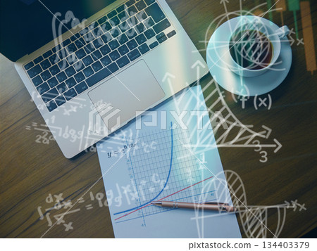 A research desk where mathematical formulas appear 134403379