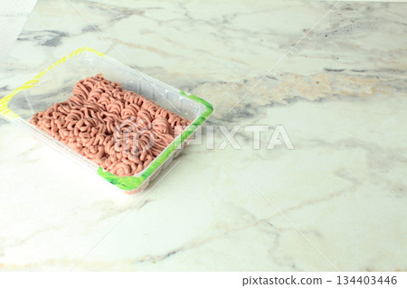 Preparation of products. Minced meat in a tray. Saving time in the kitchen. Preparation of products. Minced meat in a tray. Saving time in the kitchen. 134403446