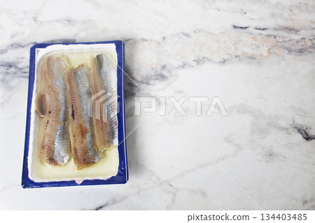 Herring fillet with space for text for salad preparation. 134403485