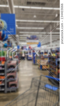 defocused abstract blur background of supermarket, minimarket, major retailer or convenience store in America defocused abstract blur background of supermarket, minimarket, major retailer or convenience store in America 134403666