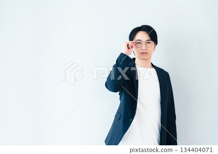 Businessman wearing glasses Businessman wearing glasses 134404071