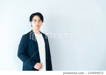 Businessman wearing glasses Businessman wearing glasses 134404072