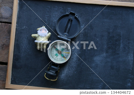 Santa Claus and compass. Christmas card. Santa Claus and compass. Christmas card. 134404672