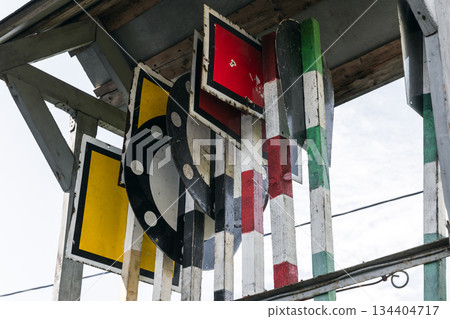 A collection of colorful railway signs and vintage signal panels A collection of colorful railway signs and vintage signal panels 134404717