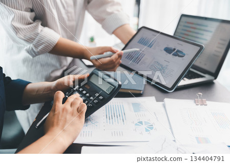 Business meeting, data analytics or women with graph presentation in office. Chart, analysis accounting team brainstorming economy, inflation or solution. business project finance investment concept. Business meeting, data analytics or women with graph presentation in office. Chart, analysis accounting team brainstorming economy, inflation or solution. business project finance investment concept. 134404791