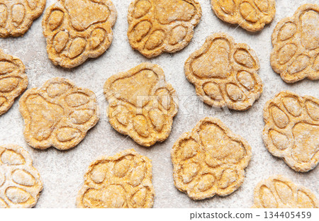 Homemade paw print dog treats baking pattern Homemade paw print dog treats baking pattern 134405459