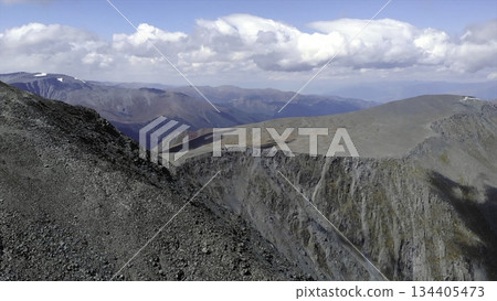 Clouds passing over mountain peaks and ridges. Media Clouds passing over mountain peaks and ridges. Media 134405473