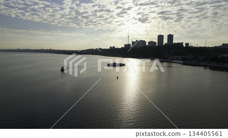 Passenger ferry approaching another ferry on dnipro river at sunrise. Clip Passenger ferry approaching another ferry on dnipro river at sunrise. Clip 134405561