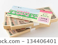 Lottery ticket and stack of 10,000 yen bills Try your luck 134406401