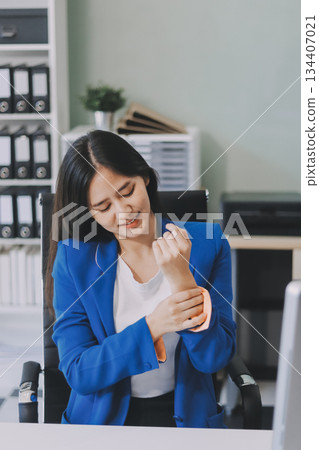 Asian women Aches from working She felt like relaxing Asian women Aches from working She felt like relaxing 134407021