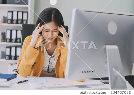 Headache, business woman at night and computer stress while working for a deadline with pc glitch. Sad corporate manager with anxiety about target working at desk screen late to complete task online 134407058