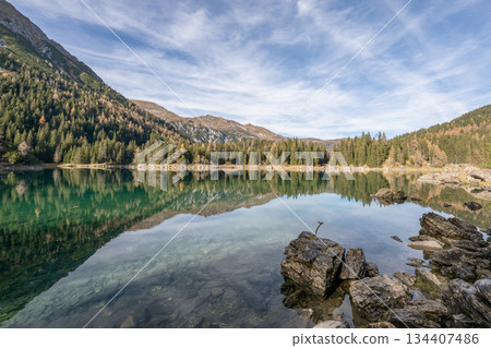 Summer time at romantic forest Lake Obernberg scenic mountain lakes landscape in Austria, Tyrol Summer time at romantic forest Lake Obernberg scenic mountain lakes landscape in Austria, Tyrol 134407486