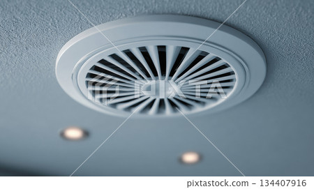 Ceiling mounted cassette type air conditioner, interior of a modern building. the ventilation system is built into the ceiling 134407916