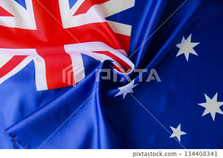 National symbol of Australia flag background. Copy space for your text. Concept of National day National symbol of Australia flag background. Copy space for your text. Concept of National day 134408341