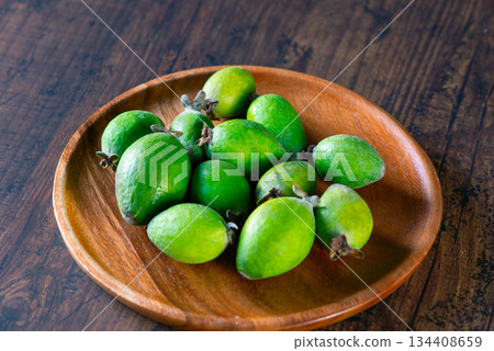 Feijoa on a wooden plate 134408659