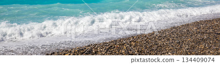 Deserted rocky pebble beach. Abstract nature pebbles background. Pebbles texture. Stone beach. Horizontal banner Deserted rocky pebble beach. Abstract nature pebbles background. Pebbles texture. Stone beach. Horizontal banner 134409074