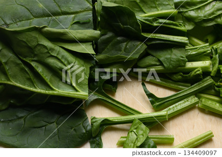 Spinach cut on a cutting board Spinach cut on a cutting board 134409097