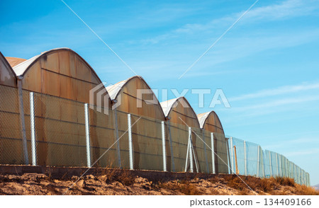 View of rows of Greenhouses on a sunny day in the south of Spain 134409166