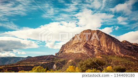 View of the mountain valley with the beautiful Mount Roc de Rombau. The Pyrenees Mountains. Peramola, Lleida, Spain 134409180
