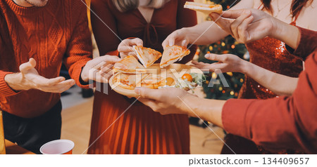Festive Office Christmas Party with Delicious Food. A beautifully decorated office space with Christmas trees and festive lights, set up for a holiday party. Festive Office Christmas Party with Delicious Food. A beautifully decorated office space with Christmas trees and festive lights, set up for a holiday party. 134409657