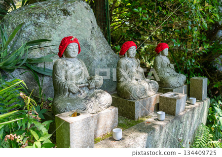 Jizo Bosatsu stone statues at Mitaki-Dera temple in Hiroshima, Japan 134409725