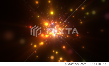 Golden glowing energy core with colorful star particles radiating from dark cosmic space 134410154