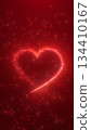 Glowing red heart made of sparkling particles on a dark background, symbolizing love, passion, and romantic energy 134410167