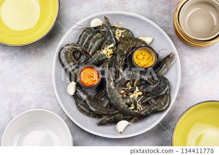 Raw scampi langoustines ready for cooking, flat lay. 134411778