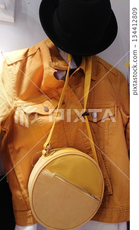 Yellow crossbody bag on mannequin Yellow crossbody bag on mannequin 134412809